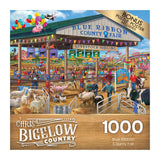 Product Description: RoseArt - Chris Bigelow - Blue Ribbon Country Fair - 1000 Piece Jigsaw Puzzle featuring a lively county fair scene with animals, rides, and spectators. The text on the box says "Blue Ribbon County Fair" and "1000 pieces". Includes a bonus puzzle poster.