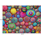 A vibrant, multicolored puzzle with various circular and heart-shaped designs, dimensions noted as 26-5/8 inches wide by 19-1/4 inches tall — RoseArt - Kodak Cork - Mandala Stones - 1000 Piece Jigsaw Puzzle.