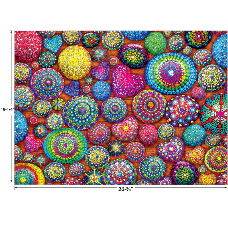 A vibrant, multicolored puzzle with various circular and heart-shaped designs, dimensions noted as 26-5/8 inches wide by 19-1/4 inches tall — RoseArt - Kodak Cork - Mandala Stones - 1000 Piece Jigsaw Puzzle.