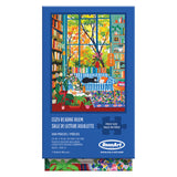 ROSEART - VERTICAL VISIONS - Cozy Reading Room 500 piece jigsaw puzzle shows an illustrated space with a large window, bookshelves, plants, guitar, cat, and colorful sofa. Product name and details displayed on the box.