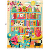 The ROSEART - VERTICAL VISIONS - Bookshelf with Cats 500 PIECE JIGSAW PUZZLE features a colorful, cozy room scene with cats, books, and charming décor; includes 500 pieces and measures 24" x 18".