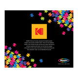 A black background with a cluster of colorful puzzle pieces scattered. Text mentions RoseArt - Kodak Premium - La Vida Las Vegas - 3000 Piece Jigsaw Puzzle and their quality, highlighting the interlocking nature and vibrant colors. RoseArt logo present.