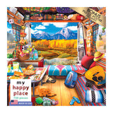 A colorful camper van interior featuring books, food, a guitar, a sleeping dog, and camping gear. The background showcases an autumn mountain landscape. RoseArt - My Happy Place - Van Life, The Grand Tetons - 750 Piece Jigsaw Puzzle.