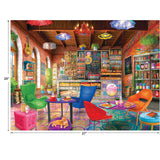 A vibrant café with colorful chairs, tables with food, brick walls, arched windows, and shelves stocked with items. Hanging lights and umbrellas add to the lively atmosphere. Dimensions: 20" x 27". Product Name: RoseArt - My Happy Place - Boho Coffeeshop - 750 Piece Jigsaw Puzzle