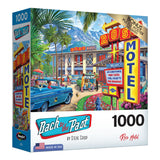 A 1000-piece puzzle box titled "RoseArt - Back to the Past - Rose Motel - 1000 Piece Jigsaw Puzzle" by Steve Crisp. The cover shows a colorful vintage motel scene with classic cars and guests. Includes a bonus puzzle poster. Made in the USA by RoseArt.