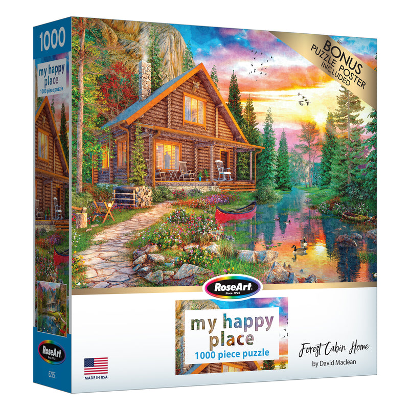 A 1000-piece puzzle box displaying a scenic illustration of a log cabin by a pond surrounded by colorful trees and mountains. The box mentions a bonus poster and the title "RoseArt - My Happy Place - Forest Cabin Home - 1000 Piece Jigsaw Puzzle" by David Maclean.