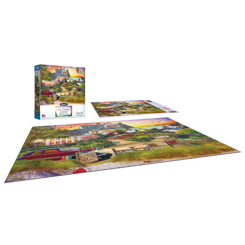 A completed RoseArt - My Happy Place - Seaside Hill - 1000 piece jigsaw puzzle is displayed next to its box and an opened guide sheet.