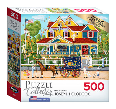 Image of a RoseArt - Puzzle Collector - Painted Lady - 500 Piece Jigsaw Puzzle box featuring colorful Victorian-style houses painted by Joseph Holodook. The box includes a bonus puzzle poster and is branded "Puzzle Collector".
