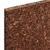 Close-up of the edge of a Board Dudes Dark Cork Tile - 4 Count 12 x 12 inches showing its texture and rough surface.