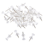 A pile of Board Dudes PUSH PINS - Clear 80 Count with metal points and transparent plastic heads, with a few pins separated from the pile.