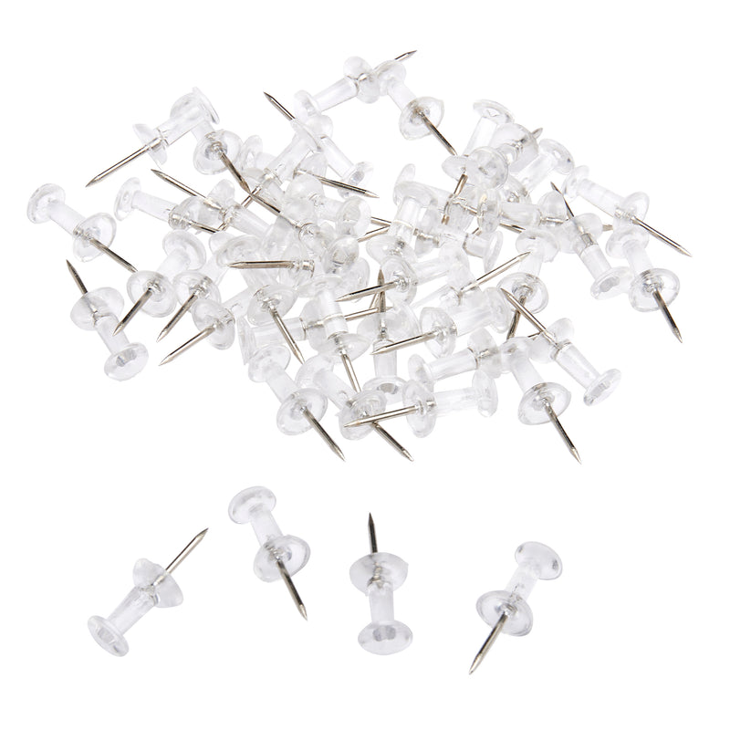 A pile of Board Dudes PUSH PINS - Clear 80 Count with metal points and transparent plastic heads, with a few pins separated from the pile.