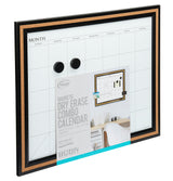 A Board Dudes Dry Erase Calendar Cork Magnetic Combo 22 x 18 inches: Stylish Organization for Any Space, displaying a monthly layout with spaces for each day. It comes with two magnetic buttons and an image of a sample setup on the front.