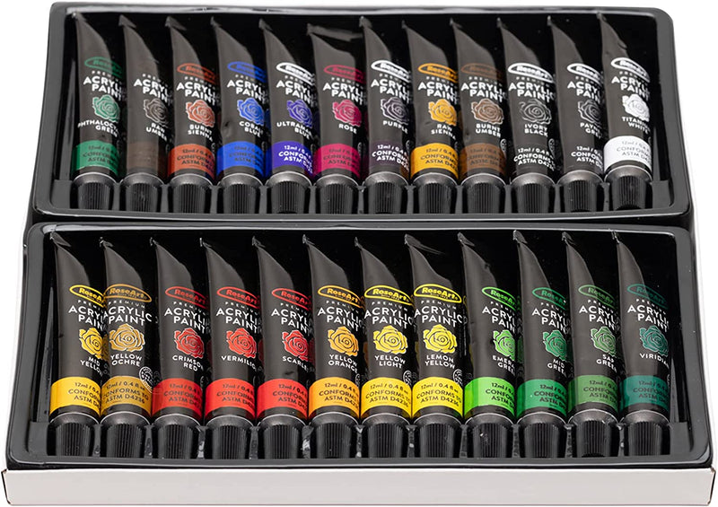 A box containing RoseArt Premium Paint Set - 24 Count Acrylic Paints for Canvas, Wood, Ceramic and Fabrics - Craft Painting Supplies for Professional Artists in various colors, organized in two rows, with each tube labeled with its respective color.