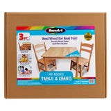 Box containing a RoseArt "My Room's Table & Chairs: Stylish Real Wood Furniture for Creative Spaces" set, including a wooden table and two wooden chairs. The package highlights its natural wood, easy assembly, and suitability for ages 3 and up.