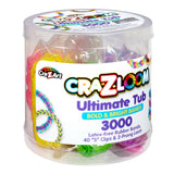 A clear cylindrical container of Cra-Z-Loom Ultimate Rubber Band Loom is filled with 3000 bold and bright rubber bands, 40 "S" clips, and a 2-prong loom. The packaging is sealed and labeled by Cra-Z-Art.