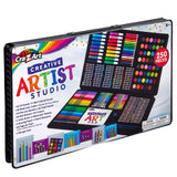A black case labeled "Cra-Z-Art Creative Art Studio, 250 Piece mega art set!" containing various art supplies like markers, colored pencils, pastels, crayons, and an art pad, with a note of 250 pieces included.