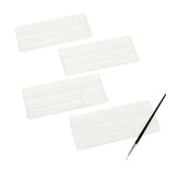 Four empty Cra-Z-Art Creative Art Studio, 250 Piece mega art sets! are arranged diagonally on a white background with a single black paintbrush placed alongside them.