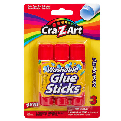 Package of 3 ct. Washable Glue Sticks, blister card, featuring three glue sticks with red caps. The packaging highlights "dries clear, fast & strong" and warns of small parts as a choking hazard.