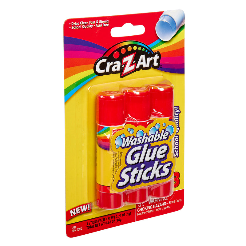 Package of 3 ct. Washable Glue Sticks, blister card, containing three glue sticks, each 0.21 oz (6 g). The package is colorful, featuring a red and yellow design with rainbow accents on the top.