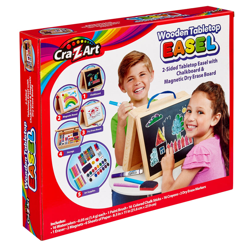 Packaging of the Cra-Z-Art 16 x 12 inch Wooden Tabletop Easel: 5-in-1 Creativity Station with Complete Art Supplies, featuring two smiling children using the product. The easel includes a chalkboard, magnetic dry erase board, crayons, markers, paint brushes, and accessories.