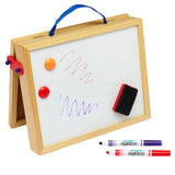 Cra-Z-Art 16 x 12 inch Wooden Tabletop Easel: 5-in-1 Creativity Station with Complete Art Supplies! with purple and red squiggles, two circular magnets, a small red eraser, and two Expo dry erase markers, one red and one blue, positioned in front.