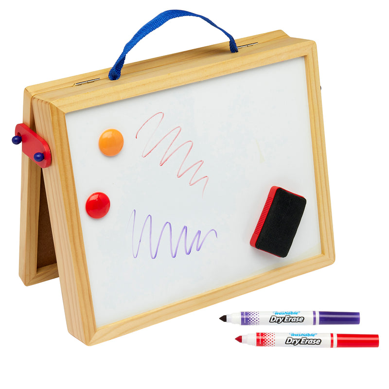 Cra-Z-Art 16 x 12 inch Wooden Tabletop Easel: 5-in-1 Creativity Station with Complete Art Supplies! with purple and red squiggles, two circular magnets, a small red eraser, and two Expo dry erase markers, one red and one blue, positioned in front.