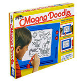 A child draws on a Magna Doodle Retro magnetic drawing toy. The toy's packaging shows various examples of drawings, encourages playing games, writing messages, and includes a warning about small parts.
