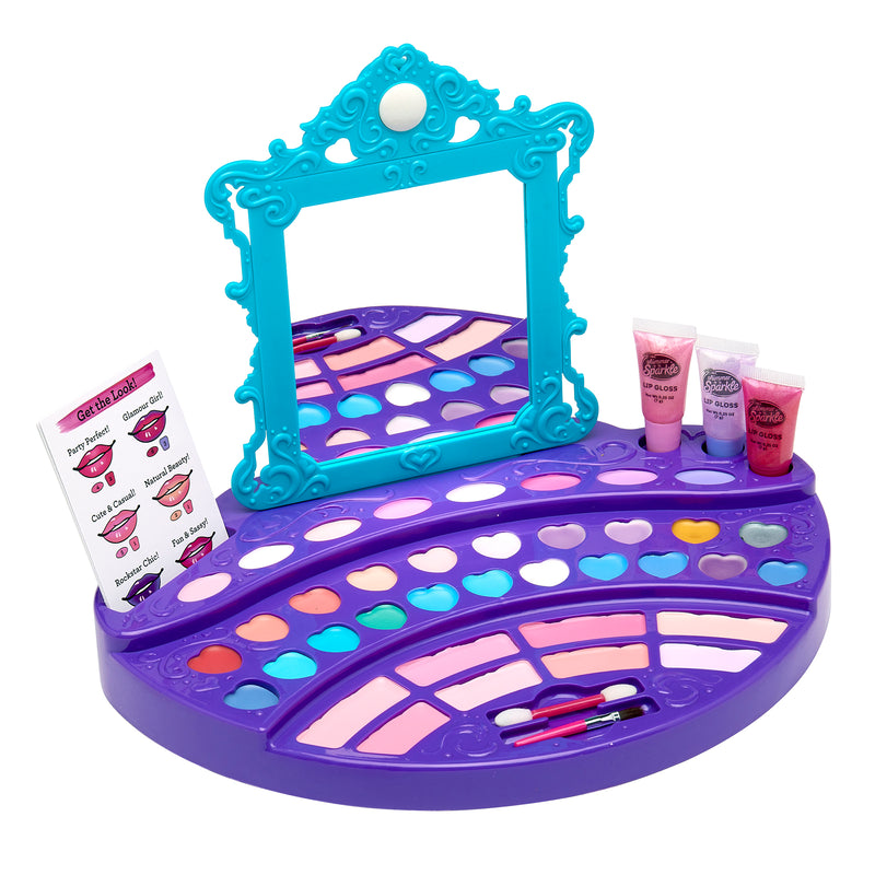 Cra-Z-Art Shimmer 'n Sparkle Real Ultimate Make Up Designer with a blue framed mirror, various heart-shaped and other containers of makeup, three tubes of lip gloss, a brush, and an instruction card.