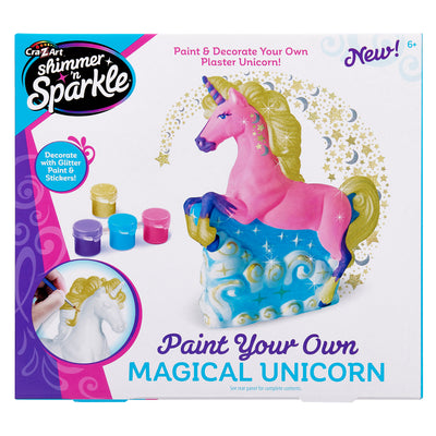 A colorful box showing a plaster unicorn statue with glitter, paint, and stickers for decoration. Text reads "Shimmer 'N Sparkle Paint Your Own Magical Unicorn: Spark Imagination with Enchanting Crafting Fun!" Suitable for ages 6+.
