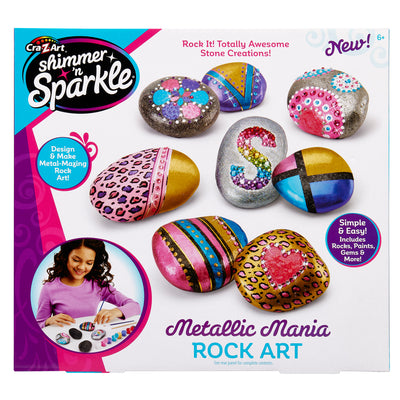 Image of a Cra-Z-Art Shimmer 'n Sparkle Metallic Mania Rock Art set. The box contains colorful painted stones and shows a girl painting rocks. Features include design tools and various art supplies.