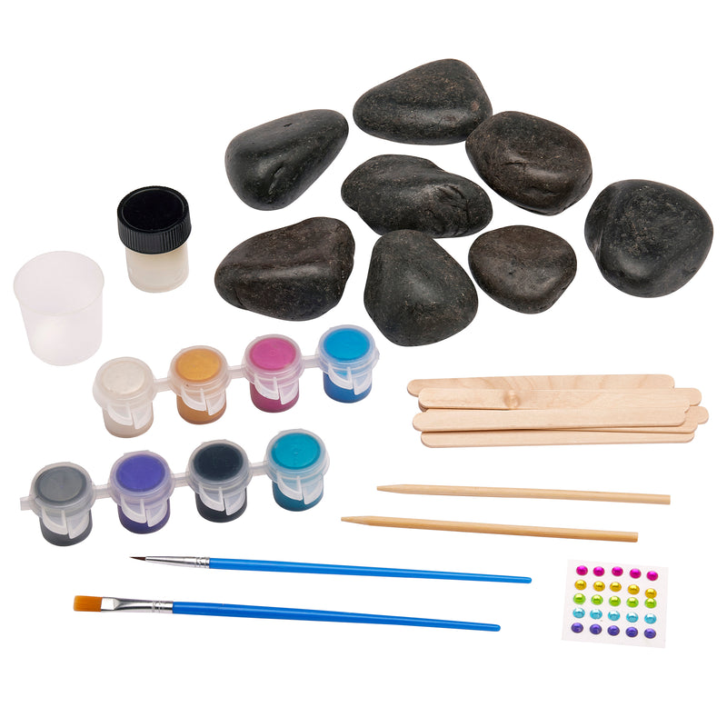 The Cra-Z-Art Shimmer 'n Sparkle Metallic Mania Rock Art includes black stones, paint pots in various colors, a paintbrush, wooden sticks, adhesive gems, and a small container.