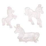 Three Shimmer 'n Sparkle Sparkling Unicorn Sand Art Creations in different poses: one standing on hind legs, one standing on all fours, and one lying down.