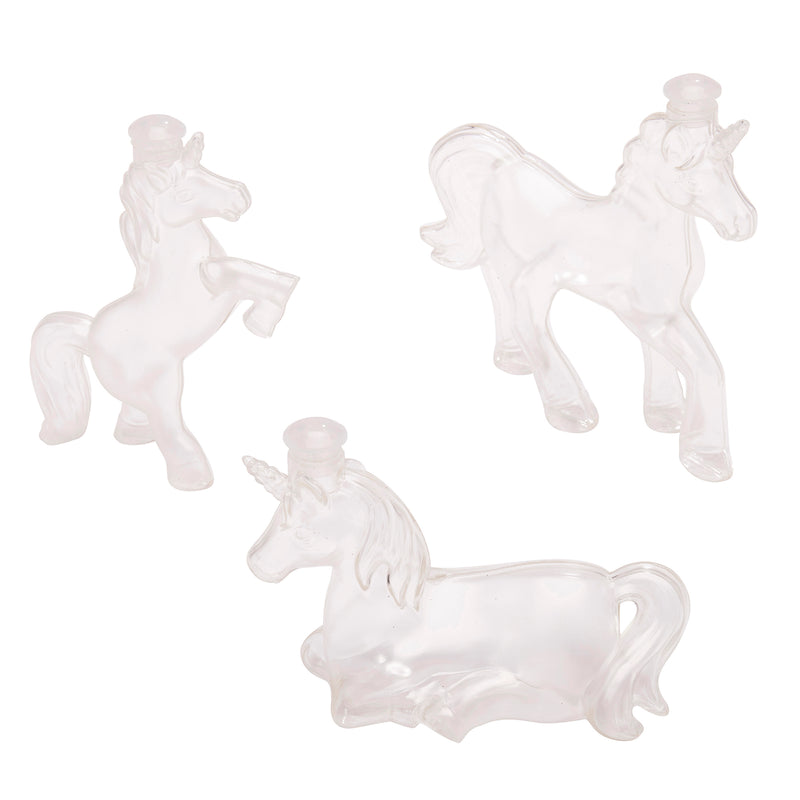 Three Shimmer 'n Sparkle Sparkling Unicorn Sand Art Creations in different poses: one standing on hind legs, one standing on all fours, and one lying down.