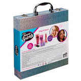 A glittery, silver carrying case with a black handle, featuring the Shimmer 'n Sparkle Glitter Case with images of beauty products and two young girls on the packaging.