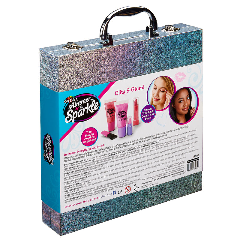 A glittery, silver carrying case with a black handle, featuring the Shimmer 'n Sparkle Glitter Case with images of beauty products and two young girls on the packaging.