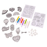 A Shimmer 'n Sparkle Color Change Window Art includes various shaped line drawings (flowers, food, unicorn) with markers, and attachment accessories for creating charms or badges.