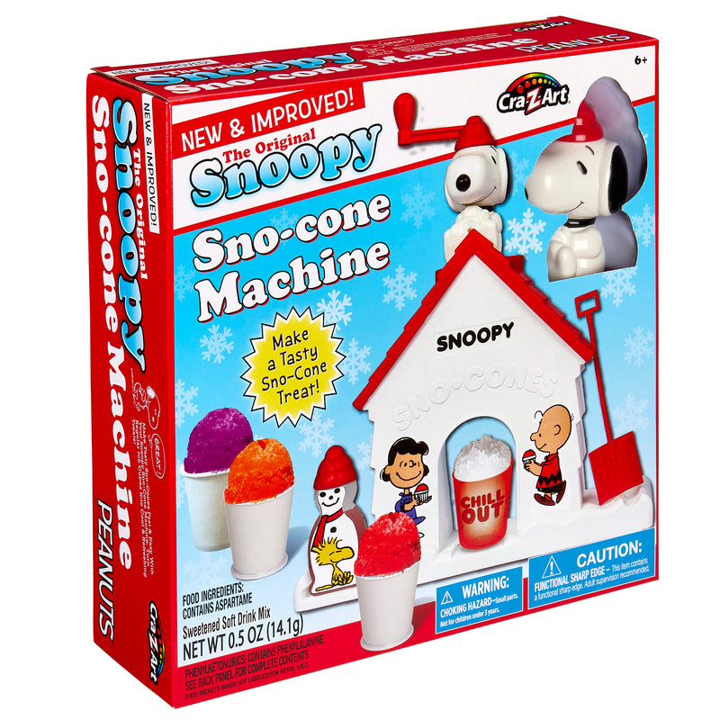 Box of "Snoopy Snow Cone Maker" featuring a Snoopy-themed snow cone making house, colorful snow cones, and Snoopy and Charlie Brown characters on the packaging.
