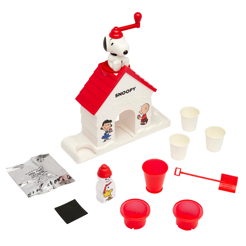 Image of a Snoopy Snow Cone Maker with accessories including three cups, two scoopers, flavored syrup, a packet, and two paper cups. The machine resembles Snoopy's doghouse with Snoopy on the roof.
