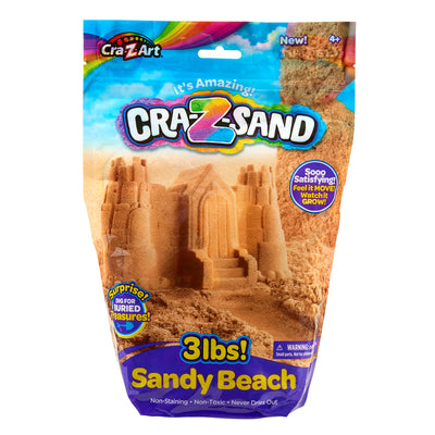 A package of Cra-Z-Sand Sand Fun Bag - Beach 3 lbs. with sandcastle graphics. Includes 3 lbs. of non-toxic, non-staining sand for ages 4 and up. Promises hidden surprises and sensory satisfaction.