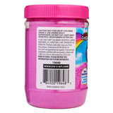 A jar of Cra-Z-Sand Pink Glitter Sand, 1.5 LB Tub with a label providing usage warnings, manufacturer information, and a barcode.