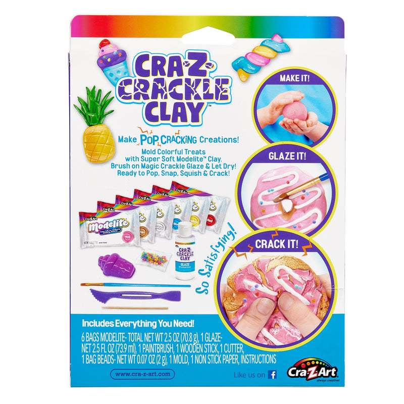 Package of Cra-Z Crackle Clay showing various tools and materials inside. Text reads "Make it! Glaze it! Crack it!" and "Includes Everything You Need!" with an illustration demonstrating the activities.