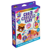 Image of Cra-Z Crackle Clay packaging. The box features colorful clay models of sweet treats, with slogans like "So Satisfying!" and instructions to make, glaze, and crack the clay. Suitable for ages 6+.