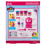 Image of the back of a Barbie Softee Dough Ice Cream Shop toy box showing contents: modeling compound, ice cream machine, ice cream cones, cups, scoops, extruder, stickers, and instructions for mixing colors.