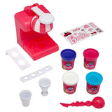 Barbie Softee Dough Ice Cream Shop with various molds, stickers, play dough containers in purple, pink, and white, two small cones, a white scoop, and a pink spoon.