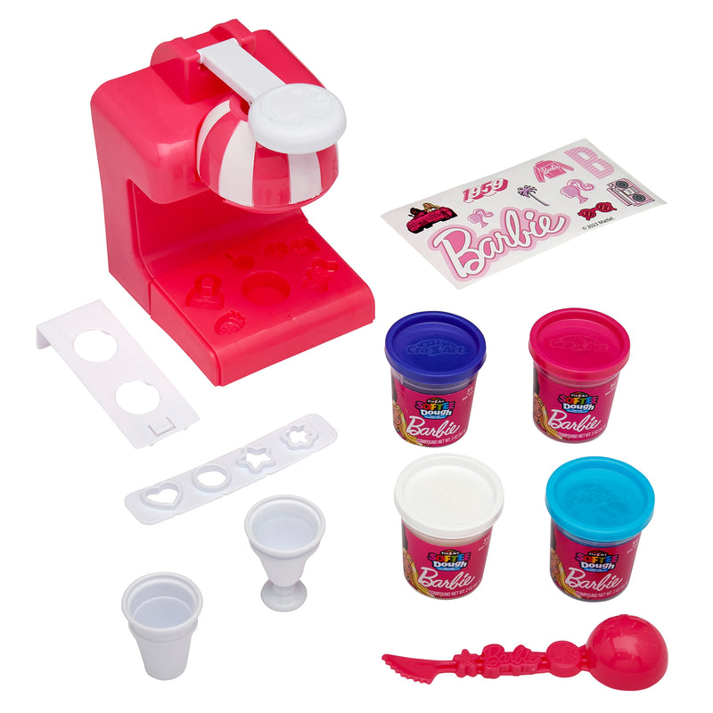 Barbie Softee Dough Ice Cream Shop with various molds, stickers, play dough containers in purple, pink, and white, two small cones, a white scoop, and a pink spoon.