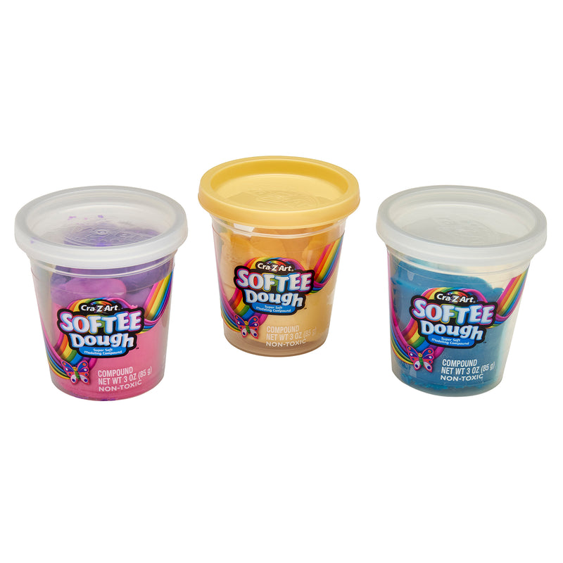 Three containers of Softee Dough Donut Shop Medium box in purple, yellow, and blue with transparent lids and colorful labels.