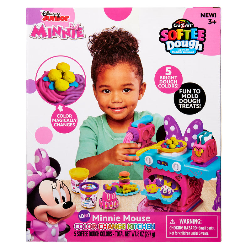 Box for Disney Minnie Softee Dough Color Change Kitchen for ages 3+, featuring a smiling child playing with included colorful dough and accessories. Contains choking hazard warning.