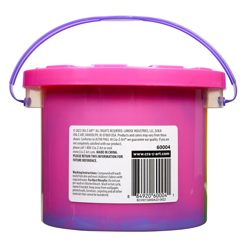 A pink bucket with a blue handle, containing art supplies, featuring a barcode and product information on the back label is called Cra-Z-Slimy Bucket TRICOLOR RAINBOW 48 OZ.