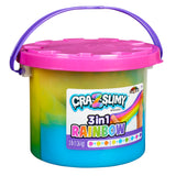 Image of a tub of Cra-Z-Slimy Bucket TRICOLOR RAINBOW 48 OZ, featuring a pink lid and multi-colored slime inside. The tub has a blue handle and contains 3 pounds (1.36 kg) of slime.