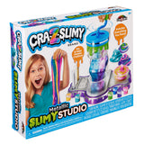 Packaging of Cra-Z-Slimy Metallic Slimy Studio, showing a child holding slime with various slime-making components pictured, along with the label, "Includes Everything You Need!